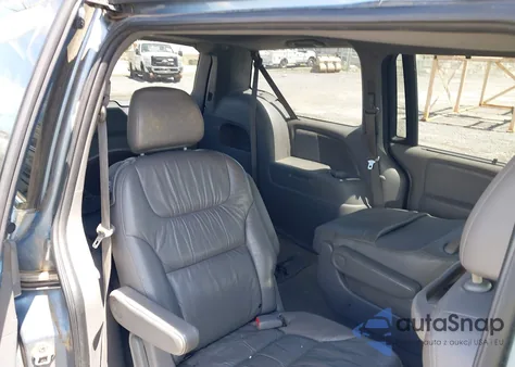 2010 Honda Odyssey Touring z USA, uszkodzony, nr VIN 5FNRL3H93AB058240